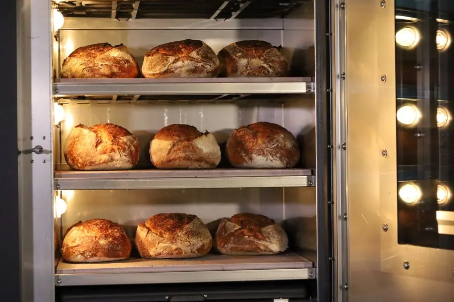Loaves on all three decks, the door open