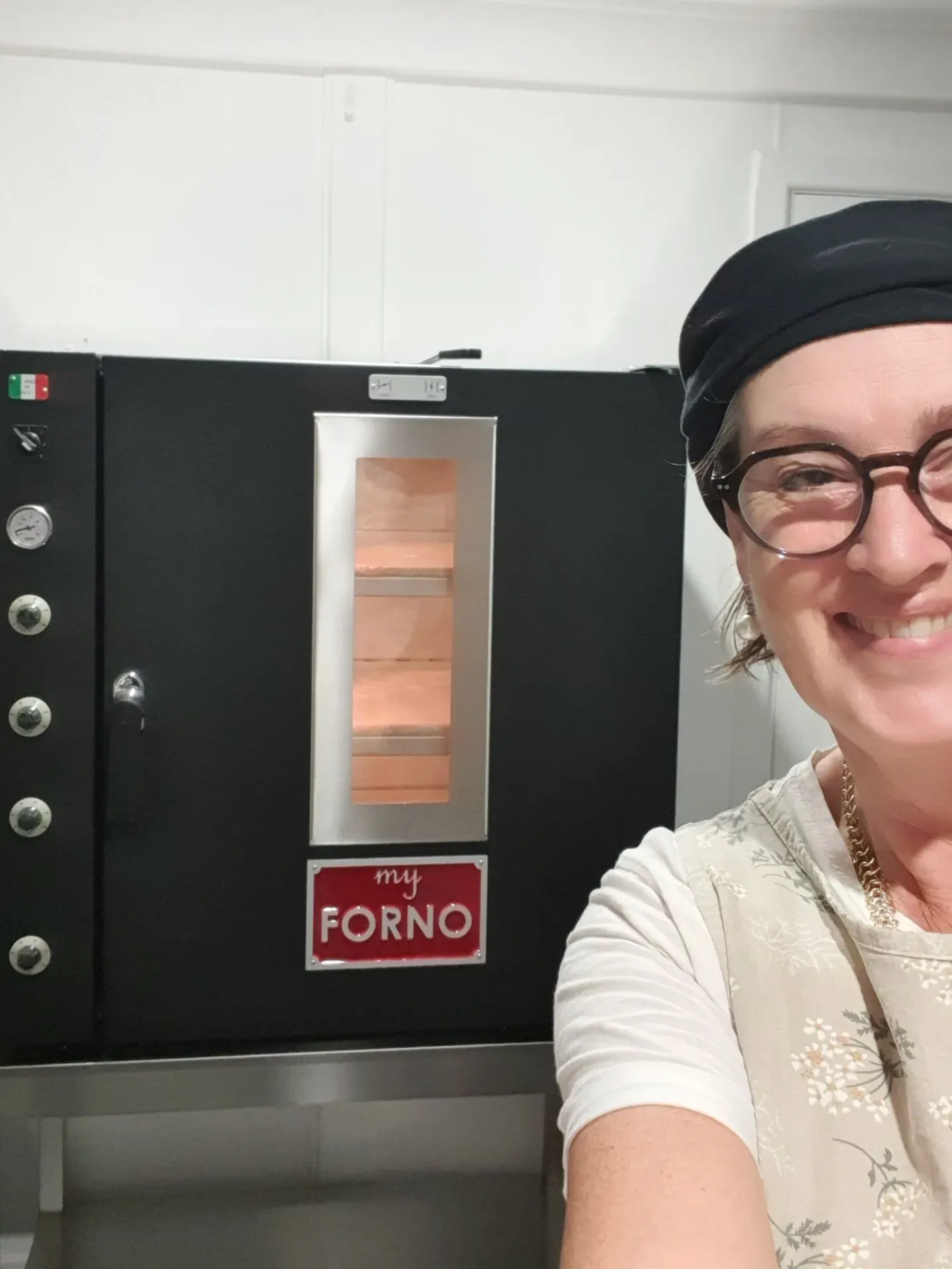 The Swinkels Sourdough baker beside her MyForno oven